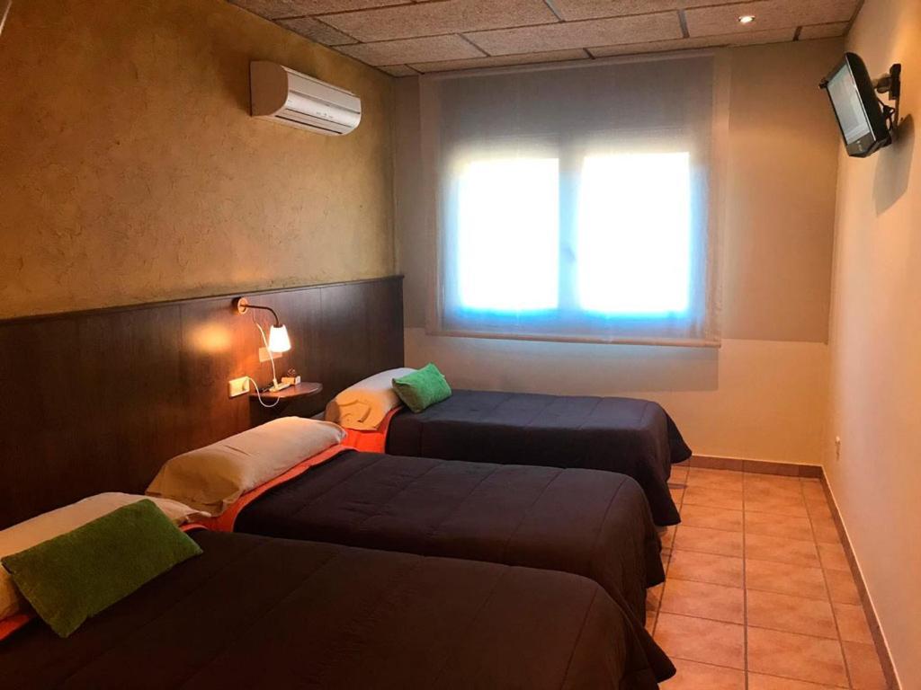 Hotel Familiar Baga Bagian luar foto